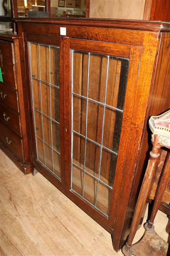 1920s oak two door leaded glazed bookcase(-)